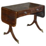 A late George III Brazilian rosewood and sycamore strung sofa table in the manner of Gillow c.1800