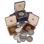 A small collection of British and foreign mostly silver coins and medallions