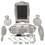 A collection of mixed silver and silver plate