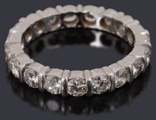 A platinum diamond set full eternity ring,