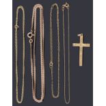 A gold cross pendant and four assorted chains