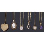 A collection of gold necklaces