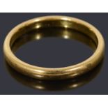 A 22ct gold court shaped wedding ring