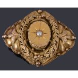 A Victorian single split pearl shield form brooch