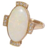 A pretty gold opal and diamond ring