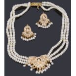 An Indian freshwater pearl necklace and matching earrings