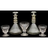 A pair of late 19th century triple ring neck ships decanters and three mid 19th century rummers