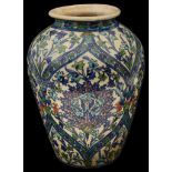 A large 19th century Iznik pottery polychrome tin glazed vase