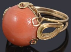 A single stone coral ring