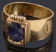 A Continental gold single stone purple sapphire ring