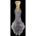 A 19th century French 18ct gold mounted cut glass scent bottle