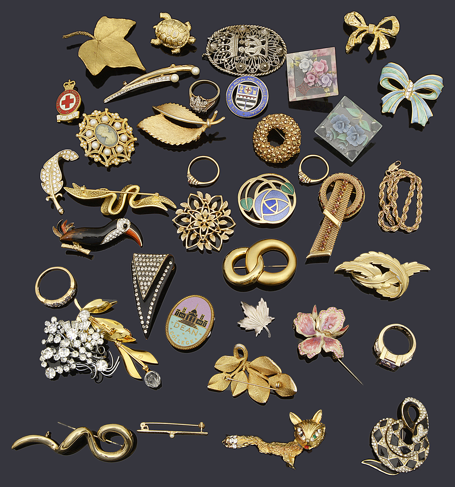 A collection of interesting brooches and rings