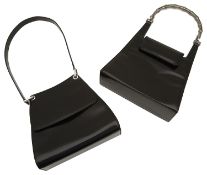 Two designer handbags and a purse,