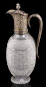 A late Victorian silver mounted cut glass claret jug