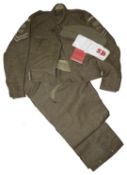 A WWII era Home Guard First Aid Officers battledress uniform and related ephemera