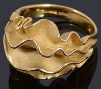 A 9ct gold scalloped edge ring