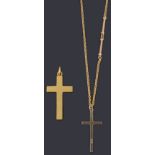 Two gold cross pendants and a chain