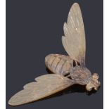 An Art Nouveau carved horn bee brooch