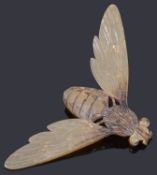 An Art Nouveau carved horn bee brooch