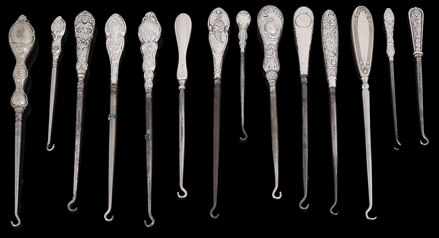 An extensive collection of mainly Victorian silver handled button hooks - Image 4 of 4