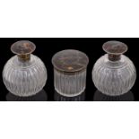 Pair of George V silver mounted tortoiseshell and pique work scent bottles and a dressing table pot,