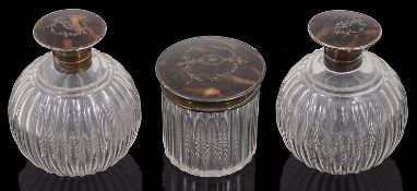 Pair of George V silver mounted tortoiseshell and pique work scent bottles and a dressing table pot,