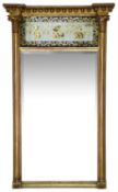 A Regency giltwood and verre elglomise pier glass