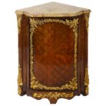 A French Louis XV walnut and ormolu mounted encoignure