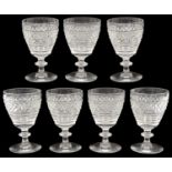 A set of seven 19th century small wine glasses