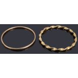 Two 9ct gold hollow bangles