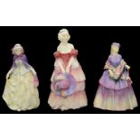 Three pre war Royal Doulton porcelain figures