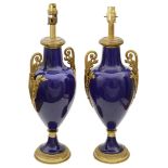A pair of late 19th/early 20th century French ormolu mounted Sevres style cobalt blue vases