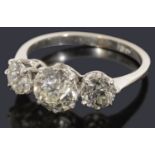 An impressive three stone diamond ring