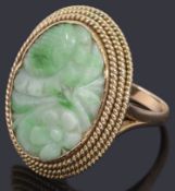 A single carved panel jade ring