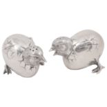 A pair of Victorian silver novelty hatching chick pepper pots
