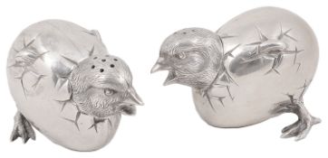 A pair of Victorian silver novelty hatching chick pepper pots