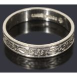 A platinum flat section wedding ring