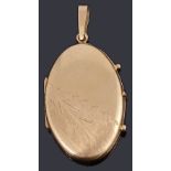 A gold oval hinge locket