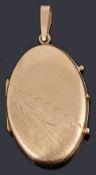 A gold oval hinge locket