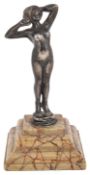 A late 19th century continental large silver figural desk seal in the form of nude female figure