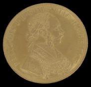 An Austrian 4 Ducat coin