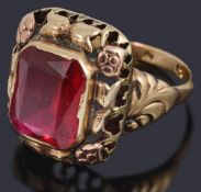 A gold single synthetic ruby stone ring