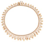 A Victorian gold Etruscan style graduated fringe necklace