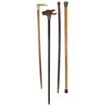 Four assorted 19th century walking canes