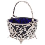 An Edward VII silver swing handled sugar basket