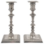 A pair of Victorian silver candlesticks in George II style