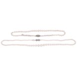 A single row graduated cultured pearl necklace and another