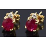 A pair of ruby and diamond stud earring,