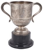 An Edwardian silver twin handled trophy cup