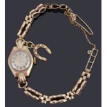 A 9ct gold ladies Uno mechanical bracelet watch